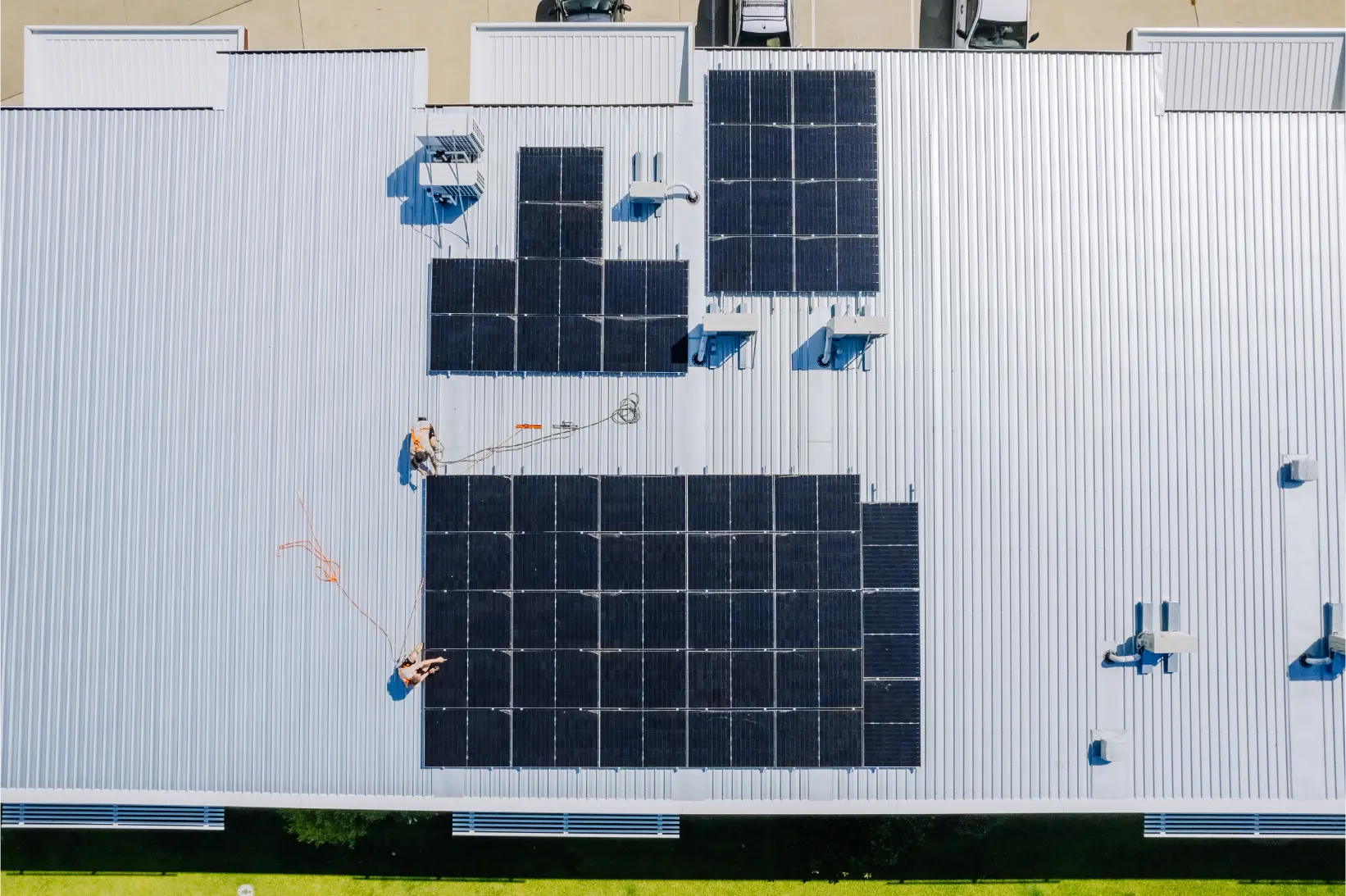 Aerial view of a commercial rooftop solar array