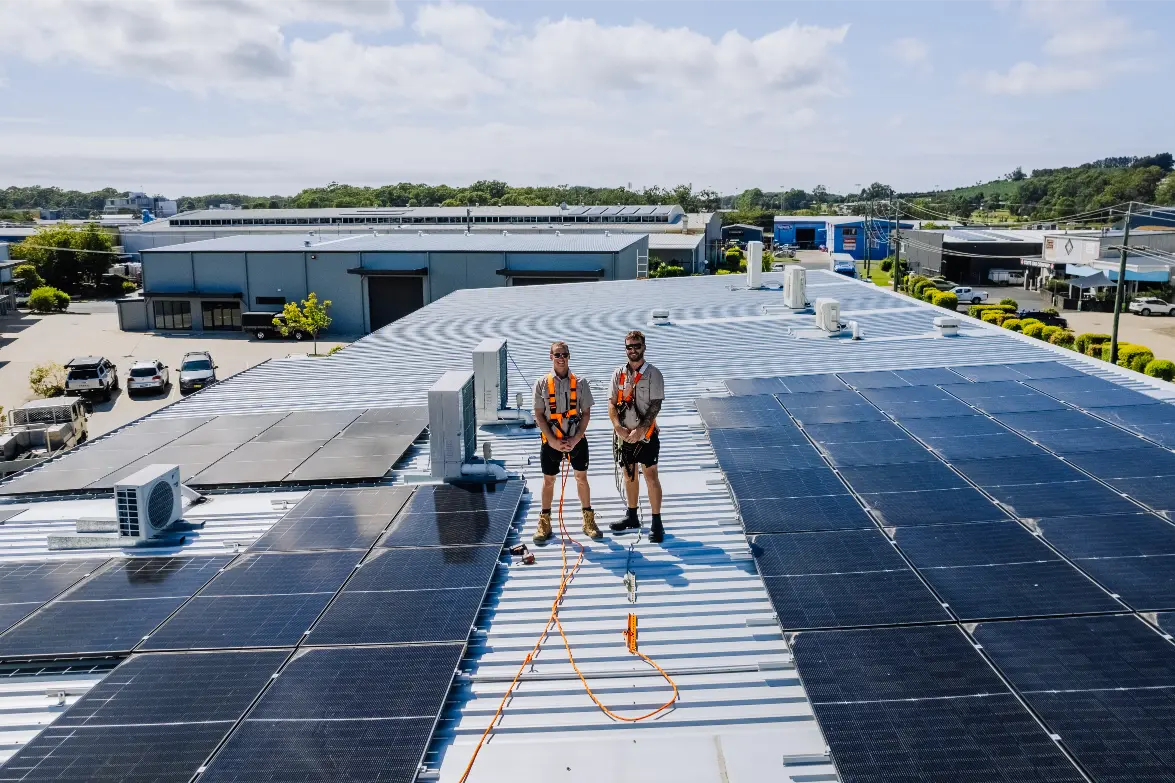 Gecko installers on a commercial rooftop solar array